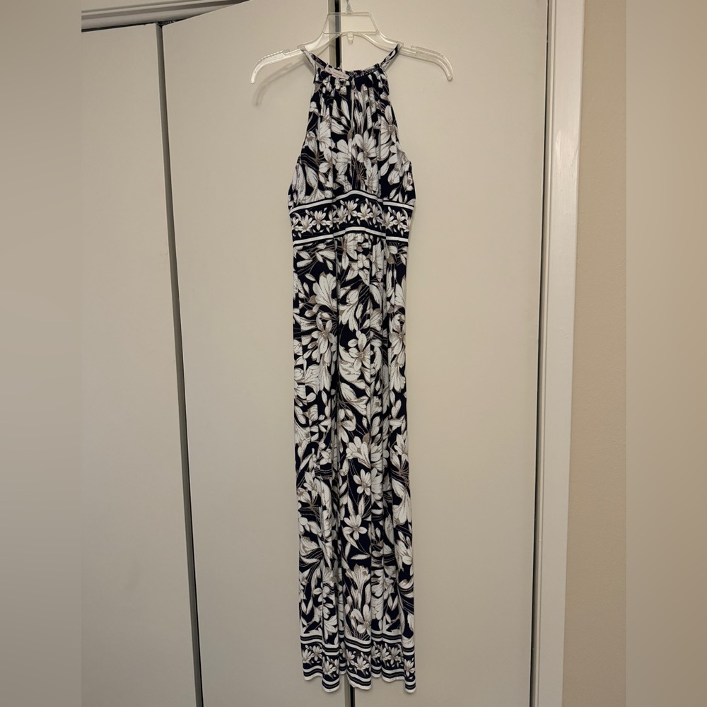 Dressy long dress. Single button in back, pull on.